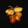 Vintage pressed amber brooch Berries