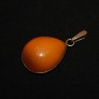 Vintage golden pendant with amber