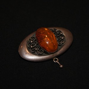 Vintage silver brooch with amber